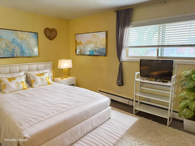 a view of a balcony with furniture