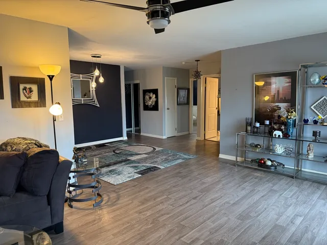a kitchen with a refrigerator a sink and a stove