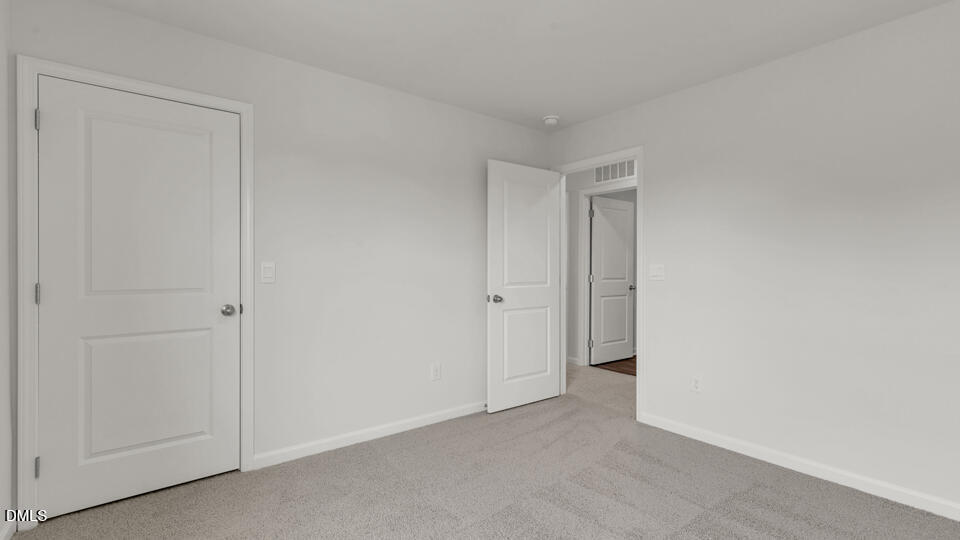 629 Stream Walk Crossing Wendell, NC 27591 - Photo 24 of 38 a view of an empty room