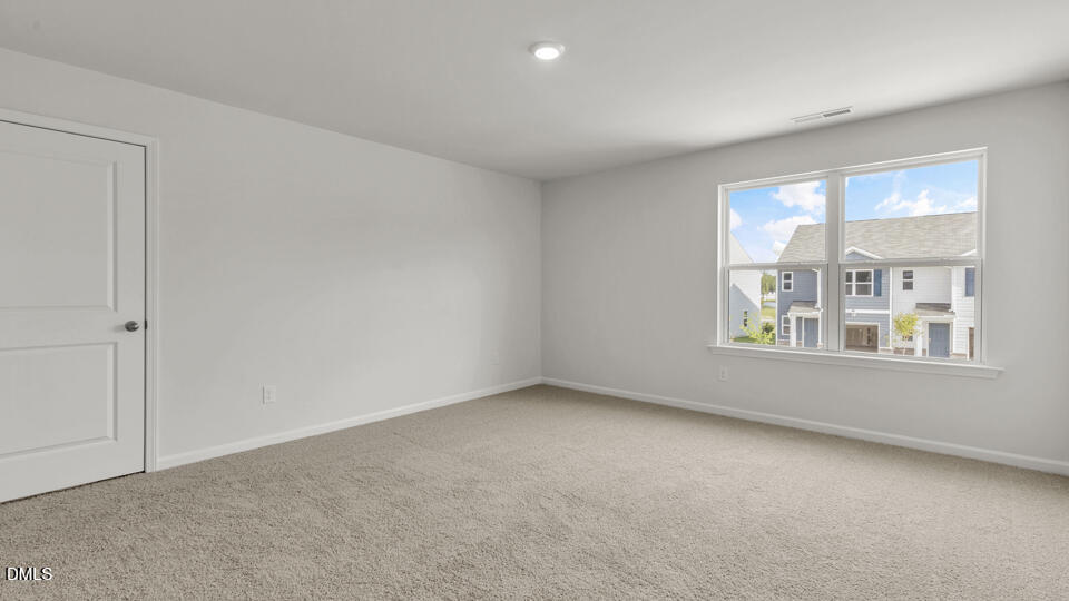 629 Stream Walk Crossing Wendell, NC 27591 - Photo 25 of 38 an empty room with a window