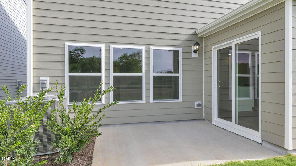 629 Stream Walk Crossing Wendell, NC 27591 - Photo 29 of 38 a view of front door with outdoor space