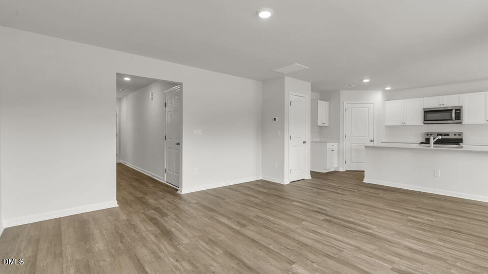 629 Stream Walk Crossing Wendell, NC 27591 - Photo 5 of 38 a view of kitchen with wooden floor