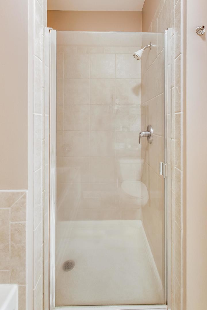 8 West Monroe Street, Unit 2008 Chicago, IL 60603 - Photo 10 of 18 a bathroom with a shower