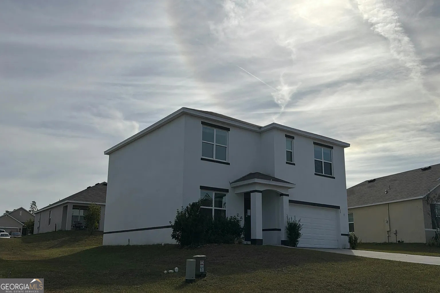 39 Hickory Course Ocala, FL 34472 - Photo 2 of 5 a house view with a garden space