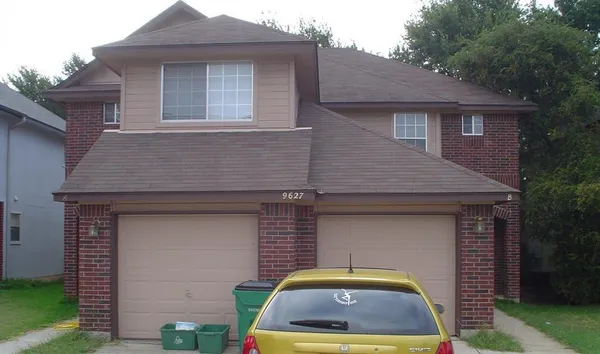 a aerial view of a house with entertaining space