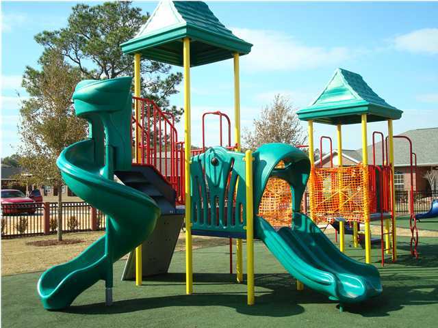 5200 Moore Loop Crestview, FL 32536 - Photo 27 of 29 a childrens park with lots of swings and slides