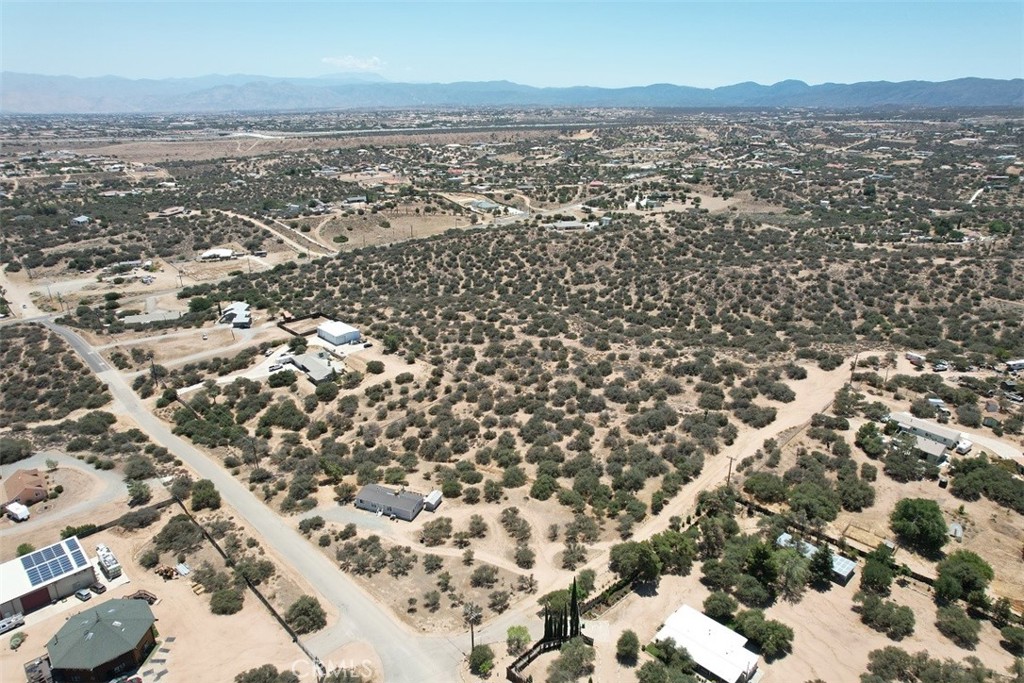 5 Oak Hill Road Oak Hills, CA 92344 - Photo 13 of 21 an aerial view of residential building with parking space