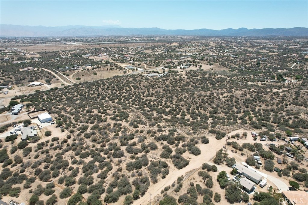 5 Oak Hill Road Oak Hills, CA 92344 - Photo 2 of 21 an aerial view of residential building with parking space