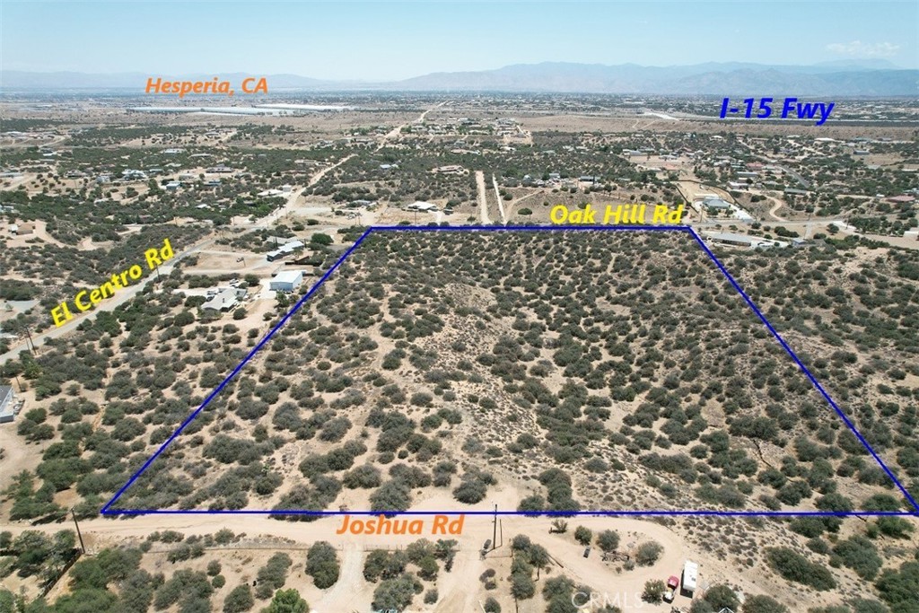 5 Oak Hill Road Oak Hills, CA 92344 - Photo 10 of 21 an aerial view of residential building and parking space