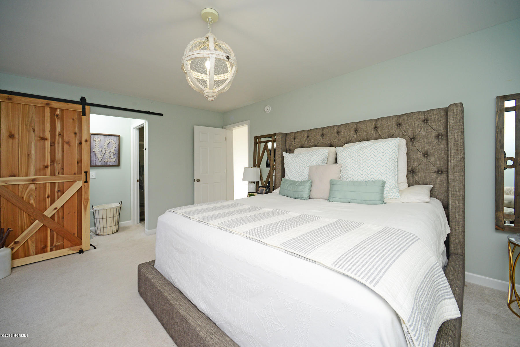 4408 Spring Pines Road Winterville, NC 28590 - Photo 24 of 44 Master Bedroom Towards Master Bath with Sliding Barn Door