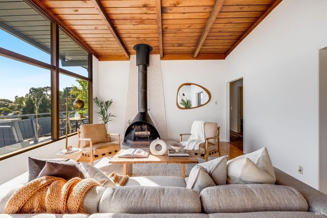 a living room with a couch and a table