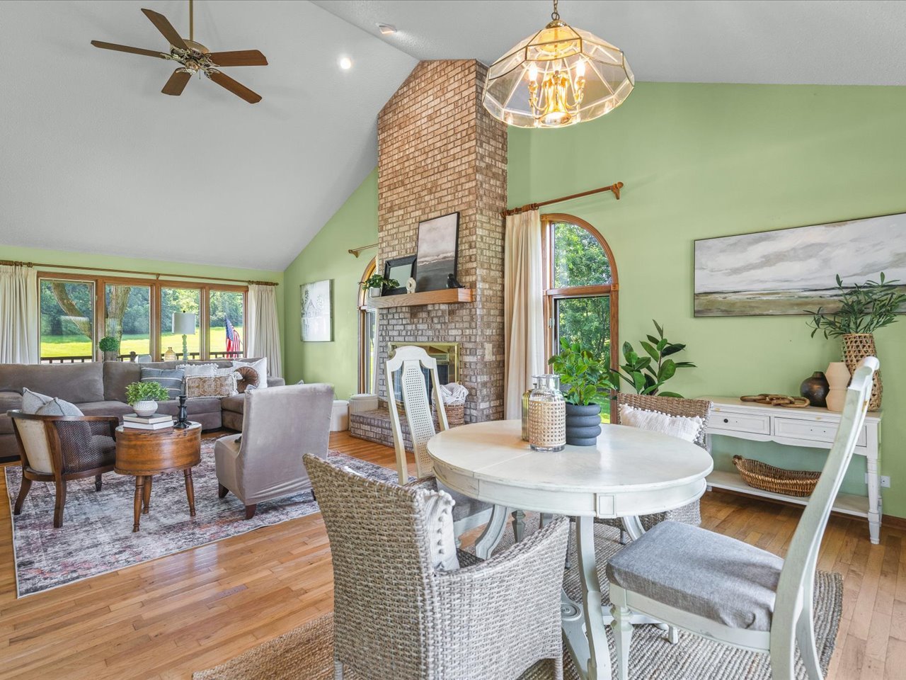 1646 Larchmont Road Davis, IL 61019 - Photo 13 of 50 a dining room with furniture a potted plant and wooden floor