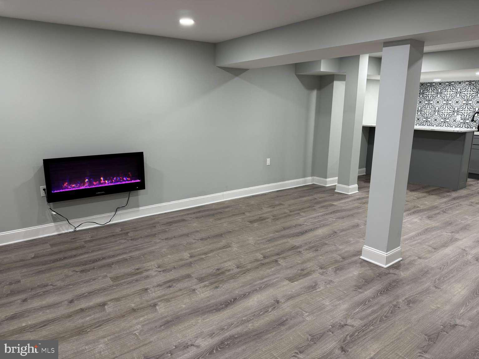 2000 Chippewa Ridge Ambler, PA 19002 - Photo 18 of 33 a view of an empty room with wooden floor and a window