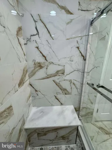 a dirty bathroom with a bathtub