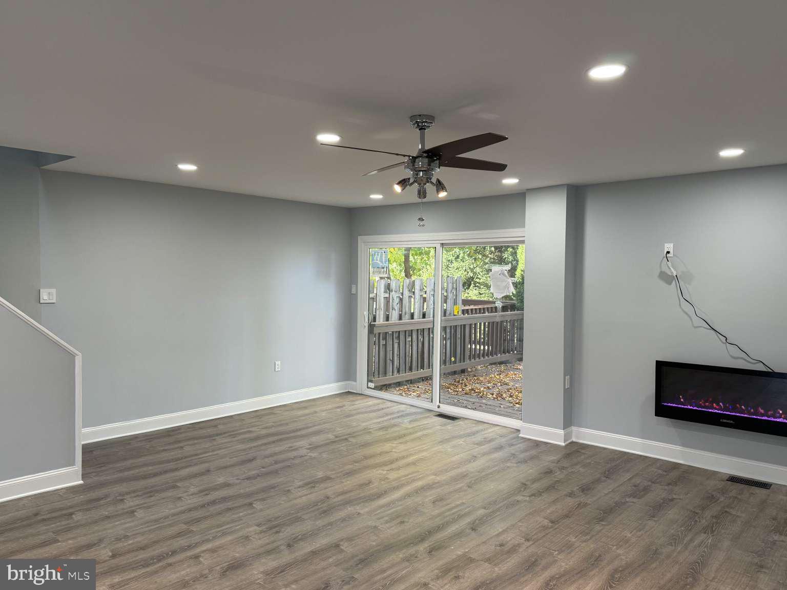 2000 Chippewa Ridge Ambler, PA 19002 - Photo 10 of 33 a view of an empty room with wooden floor and a ceiling fan
