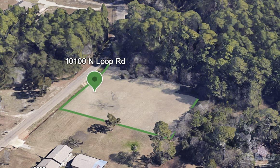 10100 North Loop Road Pensacola, FL 32507 - Photo 1 of 8 an aerial view of a backyard