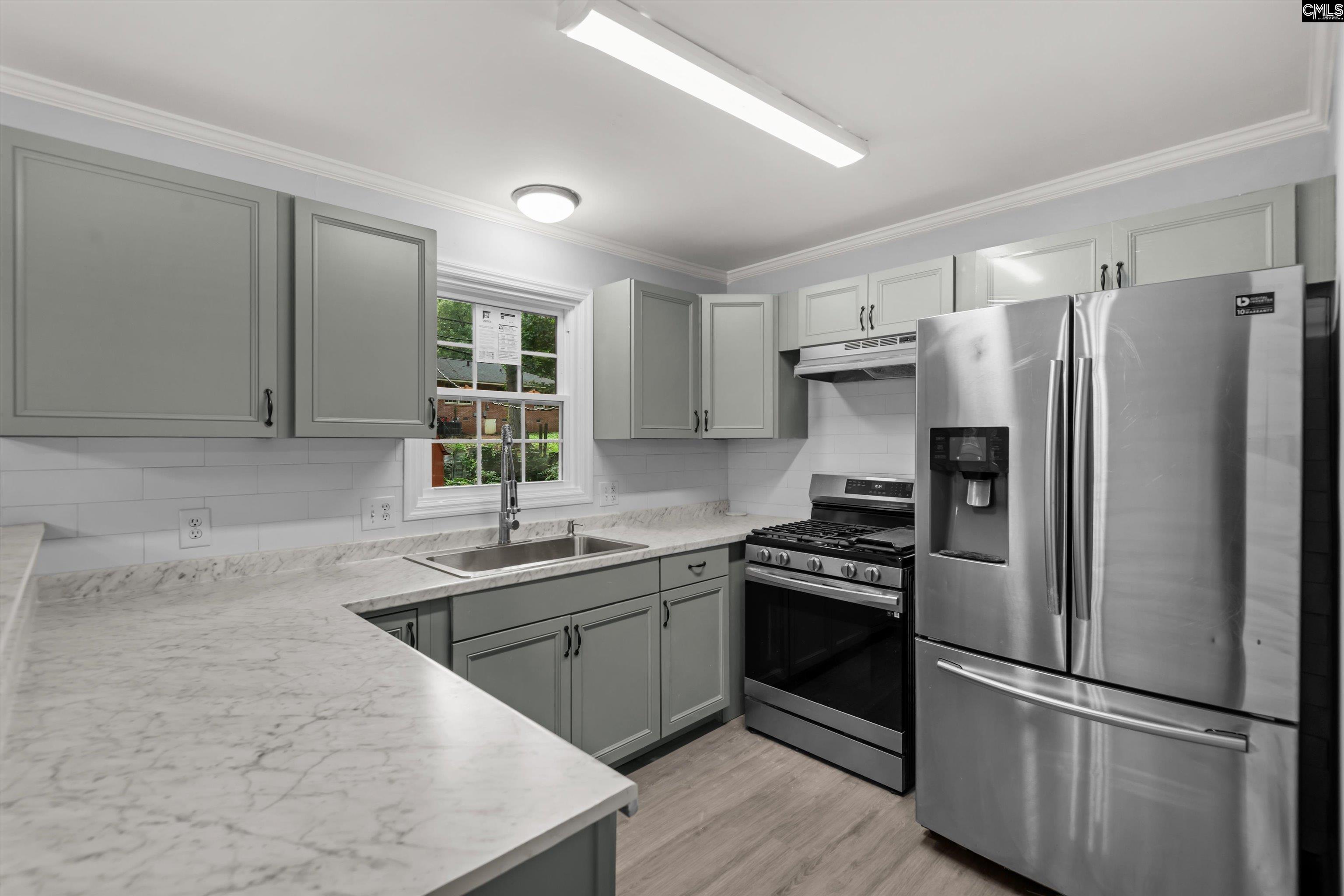 245 Piney Grove Road Columbia, SC 29210 - Photo 8 of 29 a kitchen with a refrigerator sink and microwave