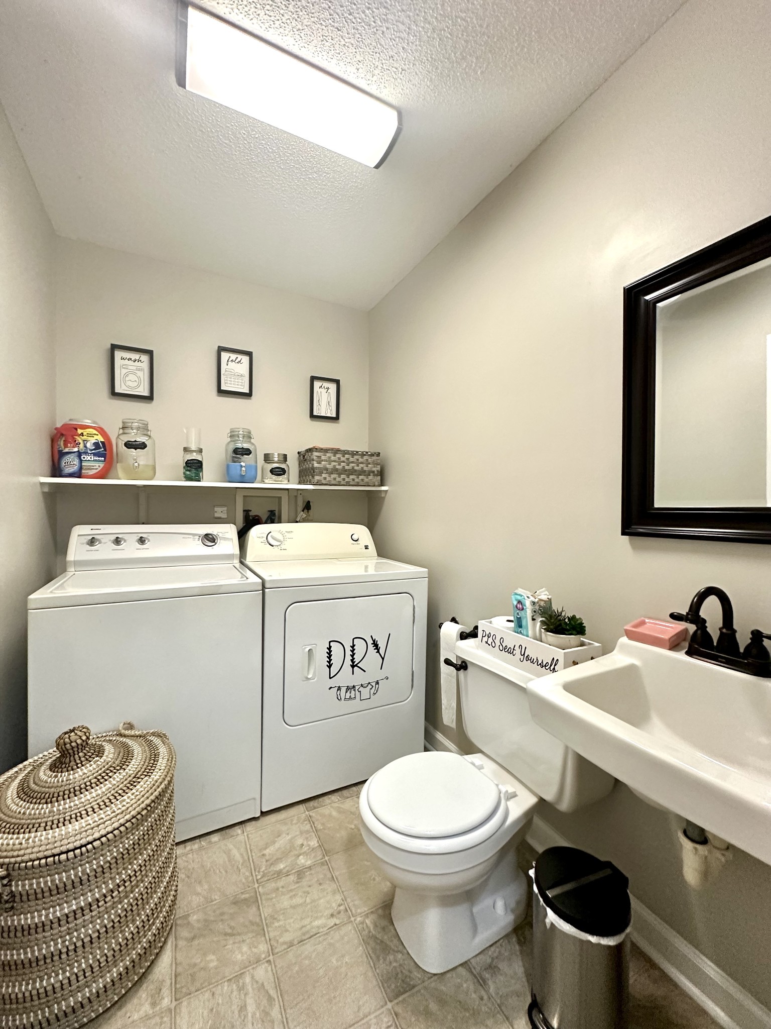 2417 Patterson Road Woodlawn, TN 37191 - Photo 31 of 68 a bathroom with a sink toilet and a mirror