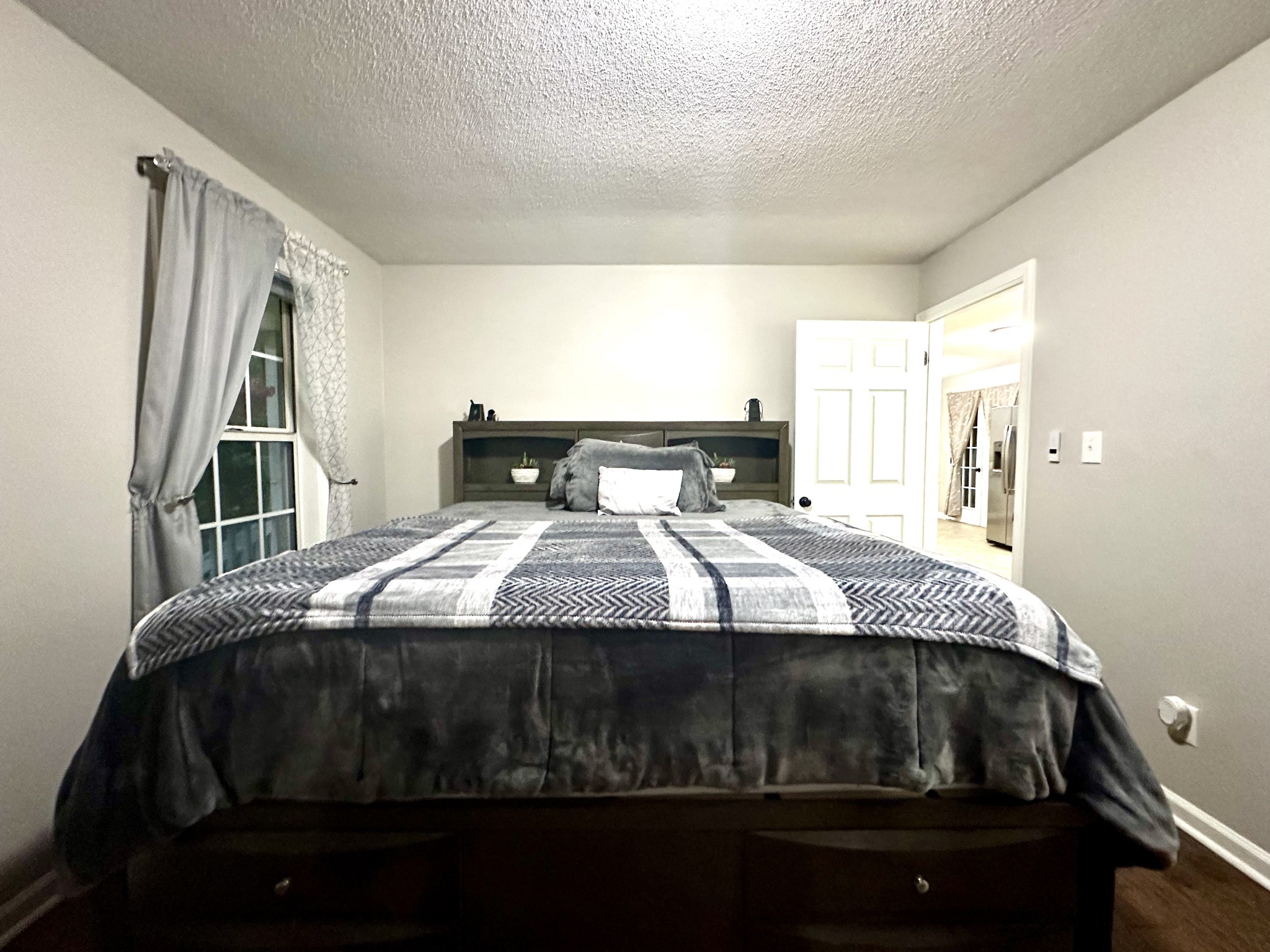 2417 Patterson Road Woodlawn, TN 37191 - Photo 35 of 68 a bedroom with a bed and a window