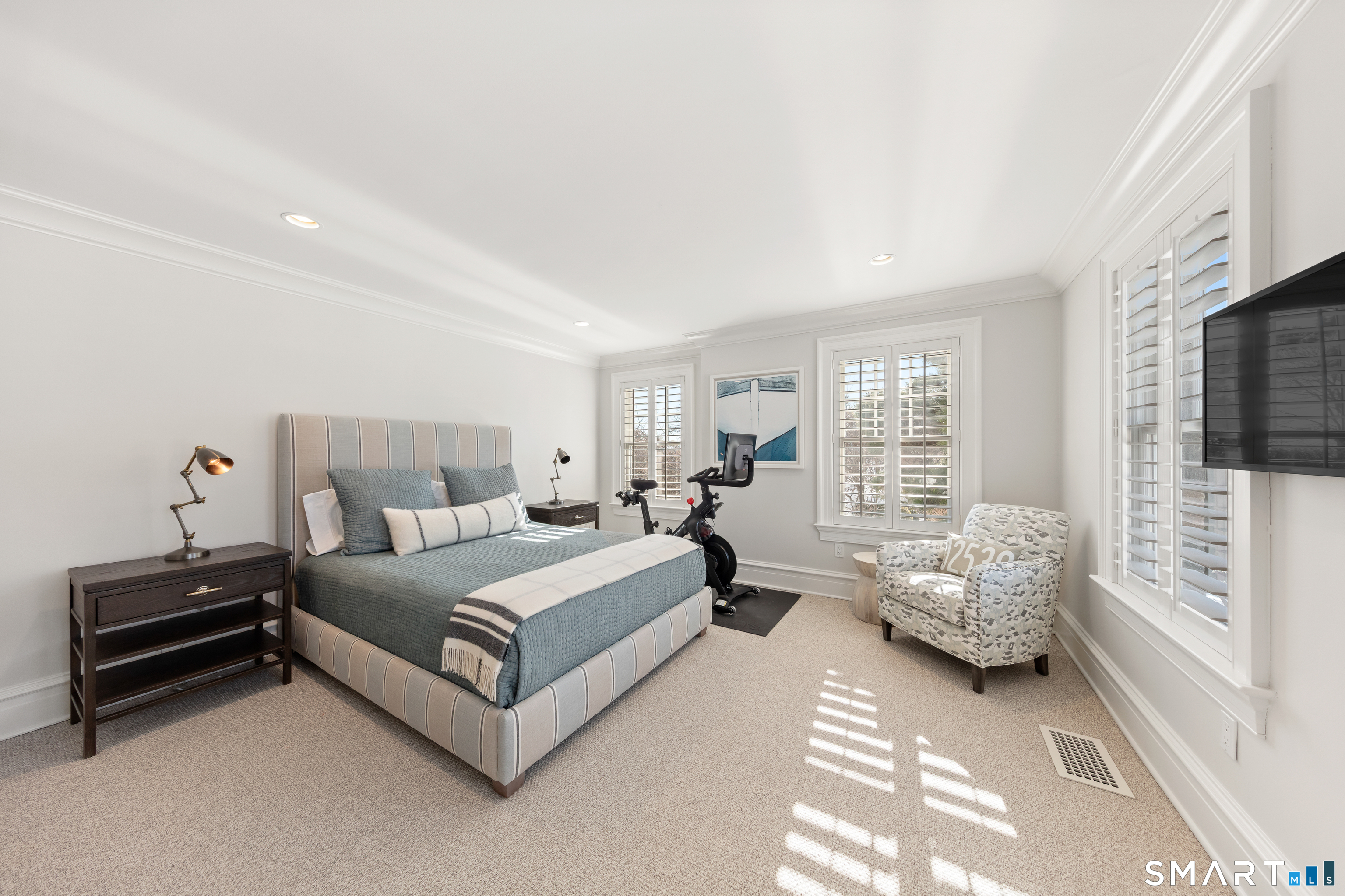 7 Sandpiper Road Westport, CT 06880 - Photo 22 of 34 a spacious bedroom with a bed and a window