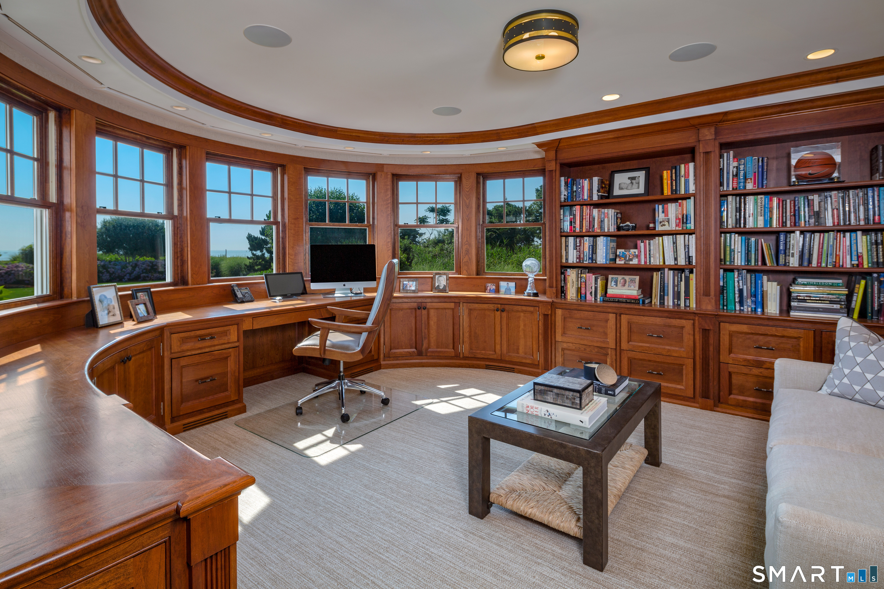7 Sandpiper Road Westport, CT 06880 - Photo 24 of 34 a living room with furniture and a large window