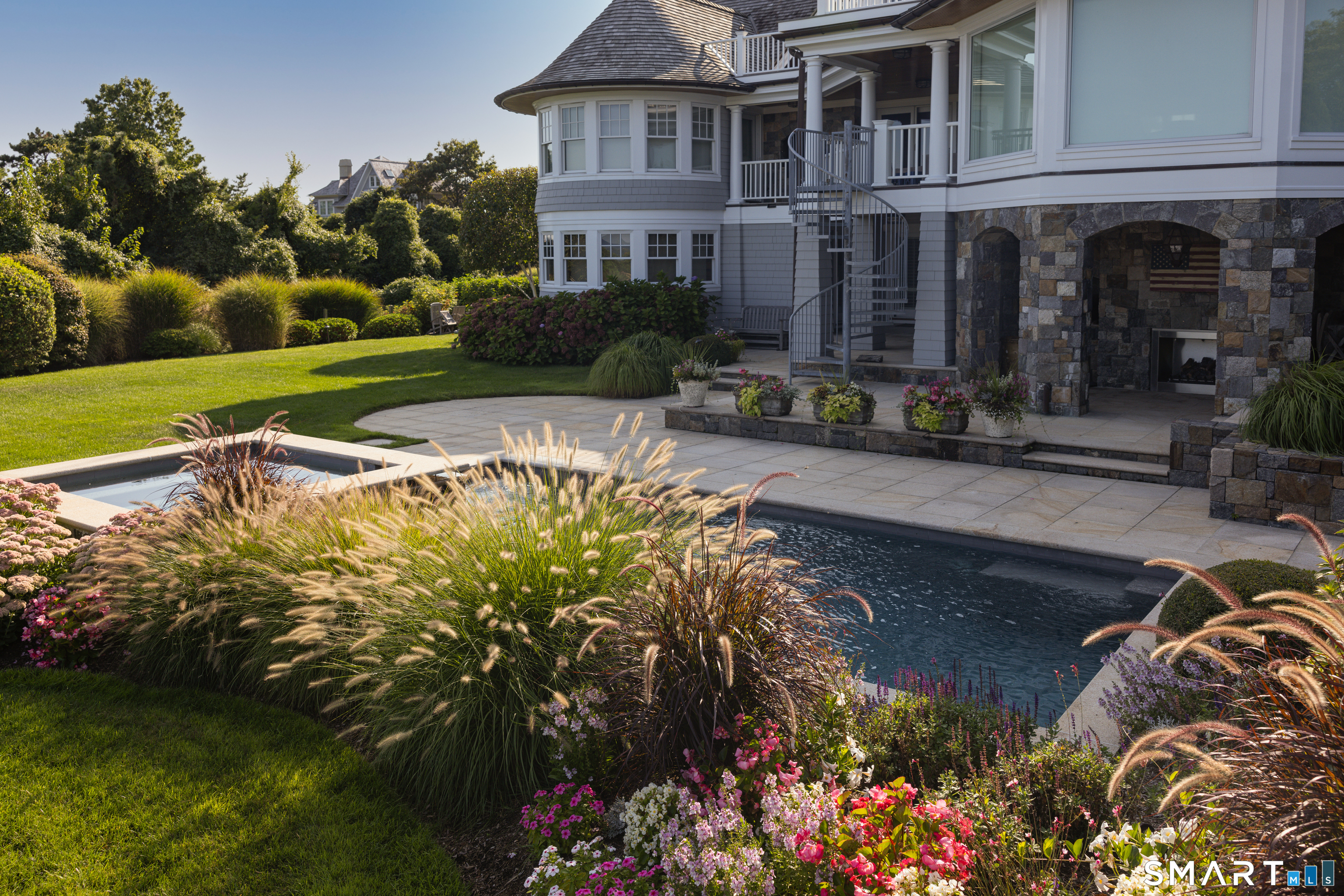 7 Sandpiper Road Westport, CT 06880 - Photo 27 of 34 a view of a house with yard and sitting area