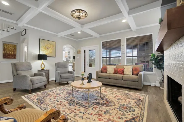 a living room with furniture or couch and a flat screen tv