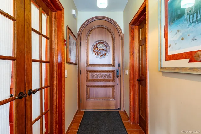 a living room with fireplace furniture and a flat screen tv