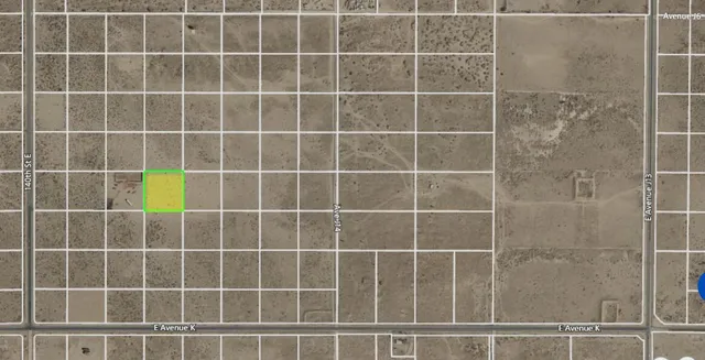 a view of a gate and a window