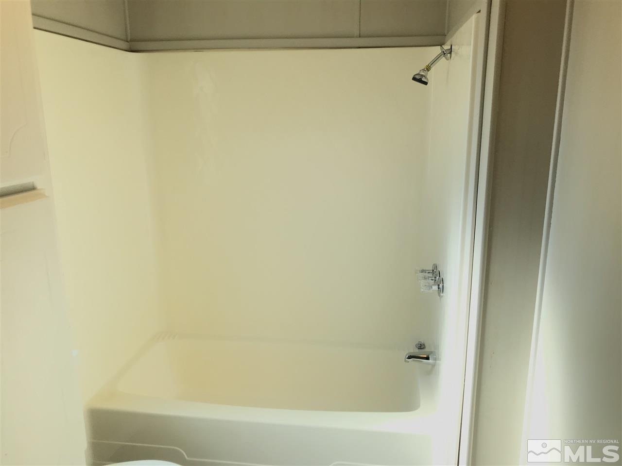 3985 Goldfinch Drive Reno, NV 89508 - Photo 15 of 15 a bathroom with a bathtub