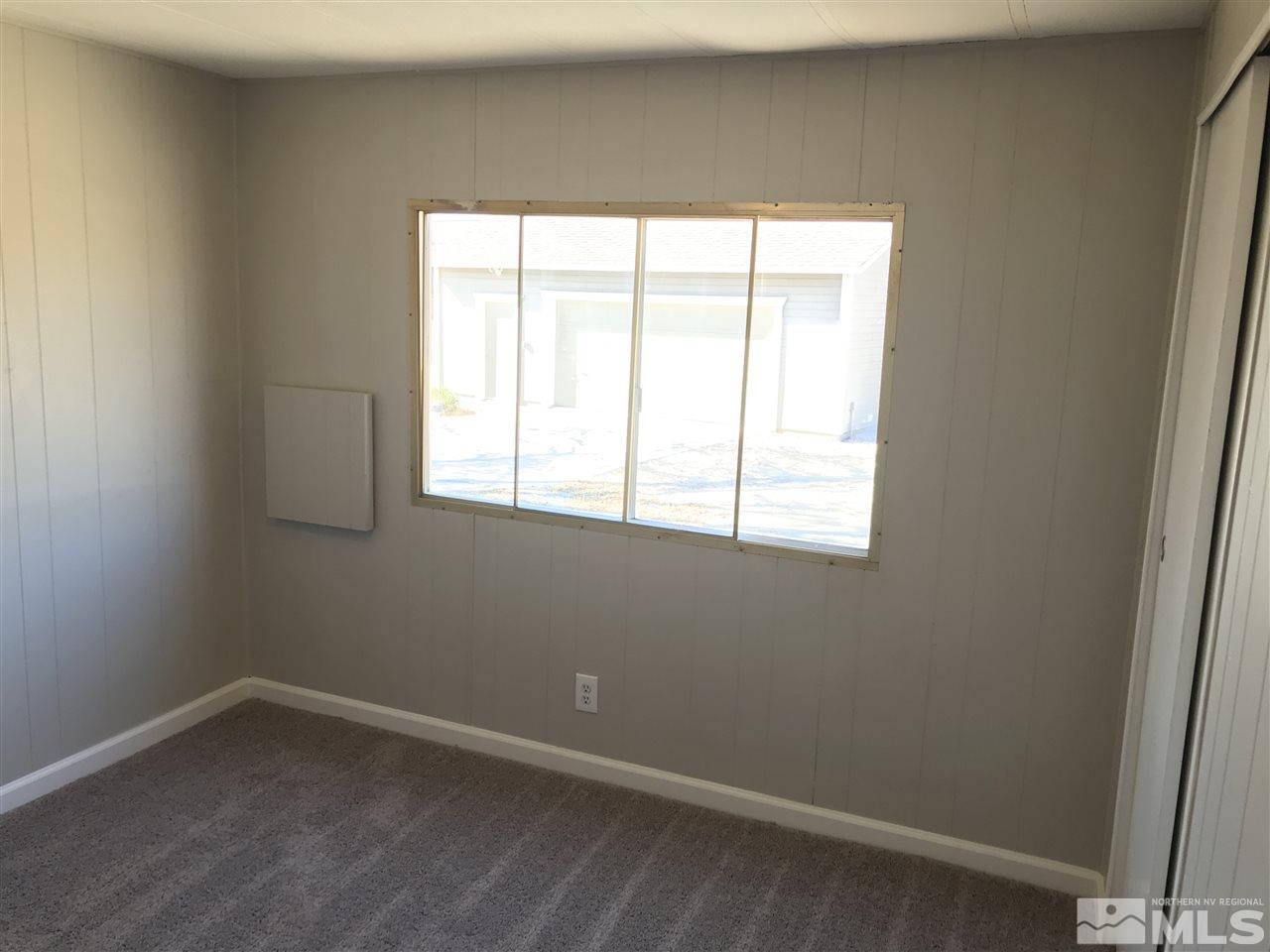 3985 Goldfinch Drive Reno, NV 89508 - Photo 8 of 15 an empty room with a window