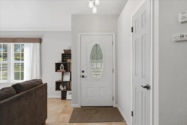 a view of a livingroom with furniture and windows