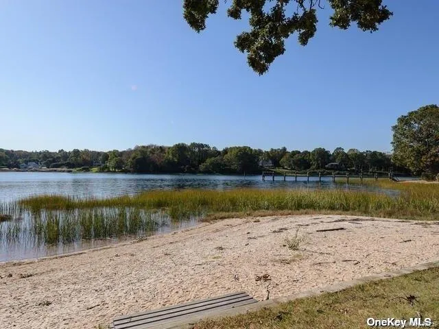 a view of swimming pool from a lake view