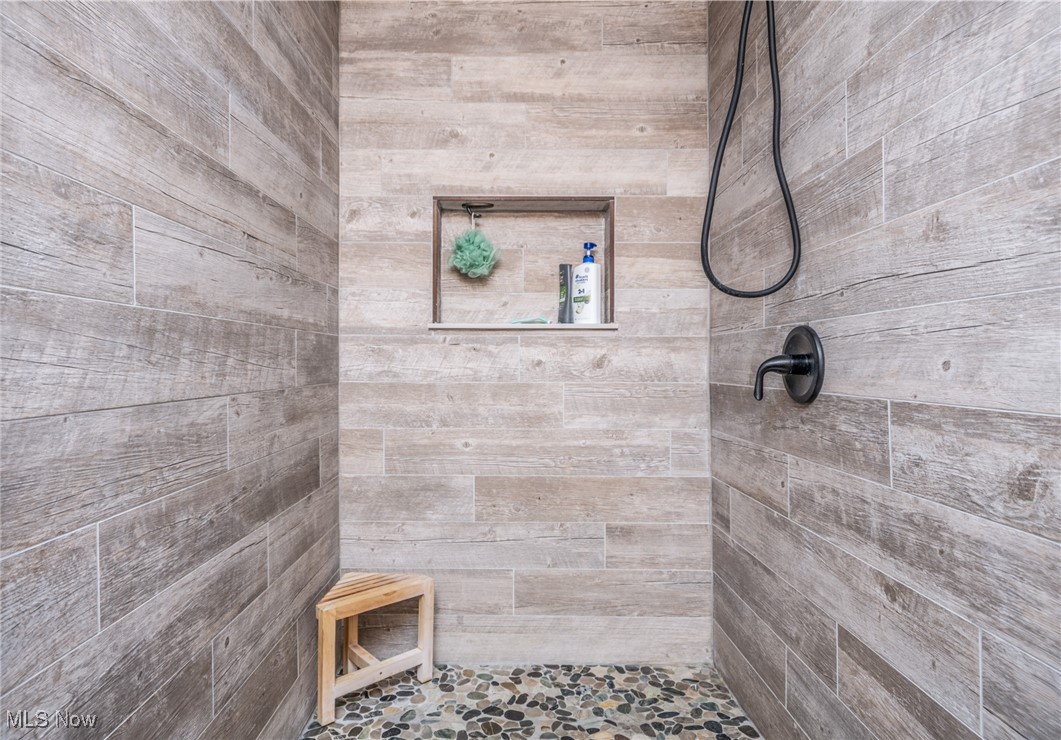 1788 Rosenbush Road Newport, OH 45768 - Photo 21 of 34 Bathroom featuring a custom, tiled, walk-in shower
