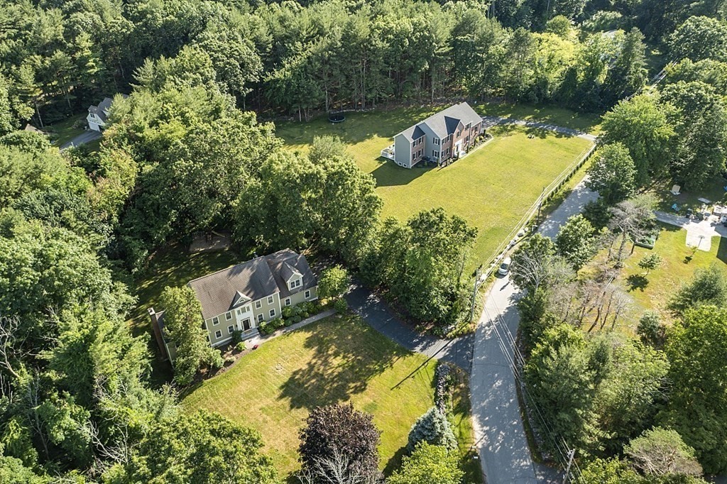 298 Old Harvard Road Boxborough, MA 01719 - Photo 1 of 42 an aerial view of residential houses with outdoor space