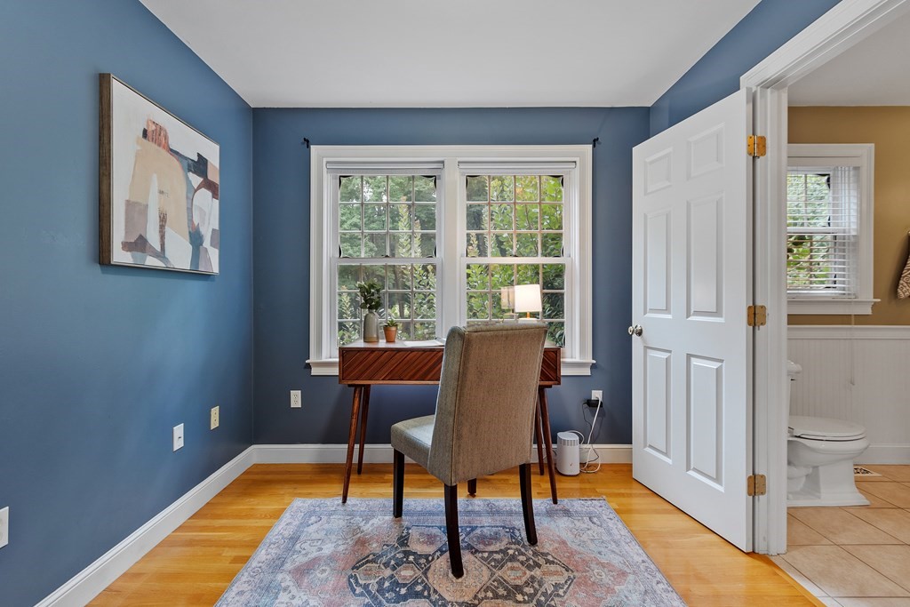 298 Old Harvard Road Boxborough, MA 01719 - Photo 15 of 42 a view of a livingroom with furniture and a window