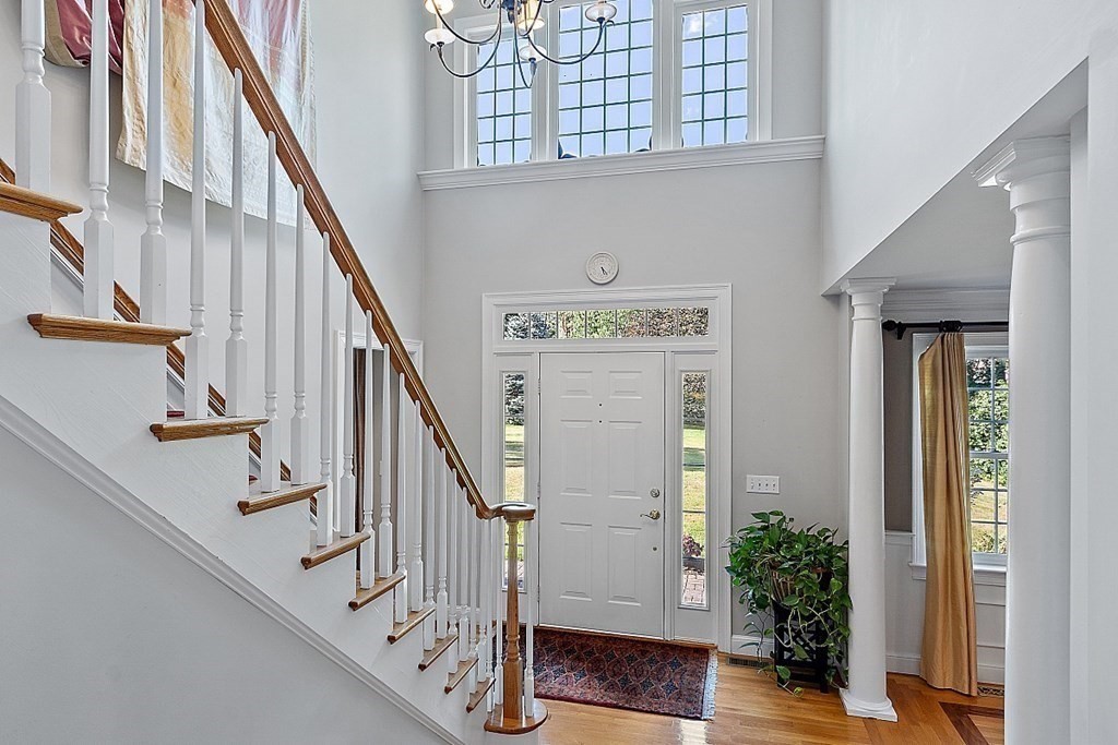 298 Old Harvard Road Boxborough, MA 01719 - Photo 4 of 42 a view of entryway with wooden floor and stairs