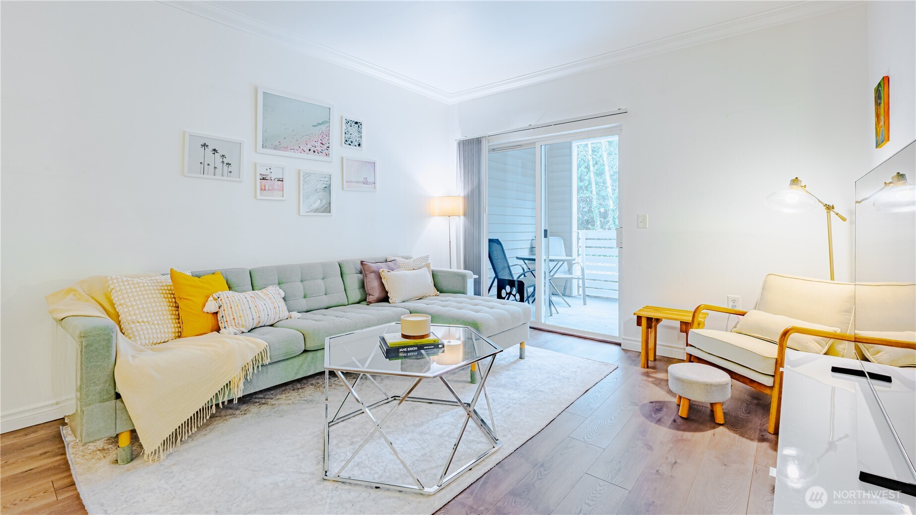 801 Rainier Avenue North, Unit G234 Renton, WA 98057 - Photo 1 of 18 a living room with furniture and a couch
