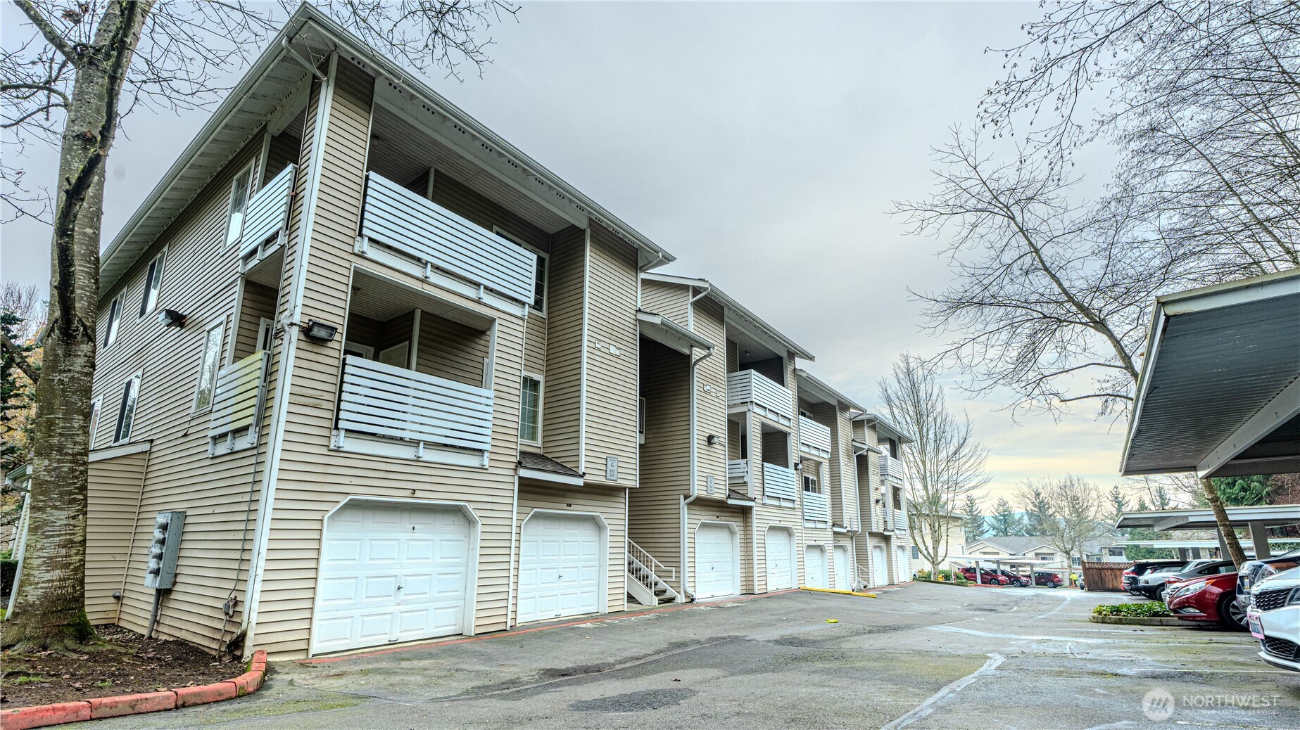 801 Rainier Avenue North, Unit G234 Renton, WA 98057 - Photo 15 of 18 a view of a building with a street