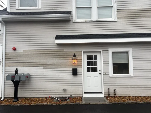 a view of a house with white door