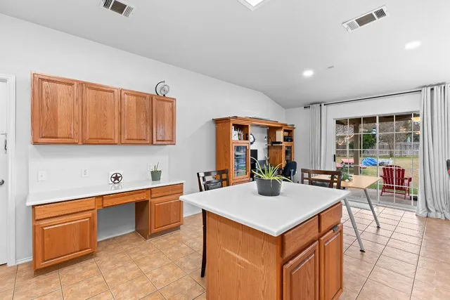 a view of a kitchen and sink