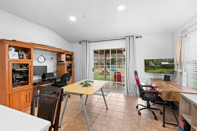 a workspace with furniture window and outside view