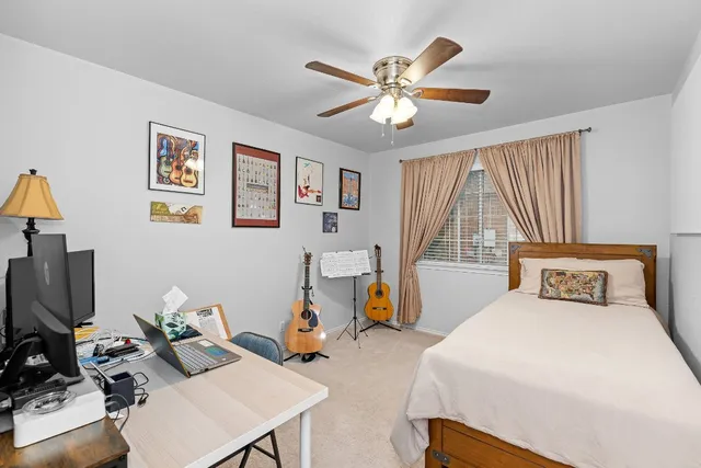 a bedroom with a bed and furniture