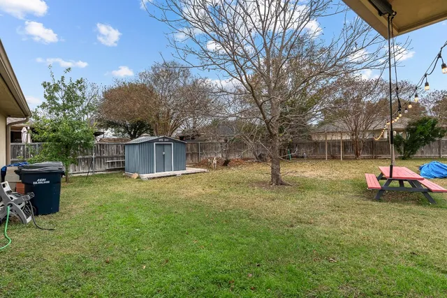 a backyard of a house with seating space