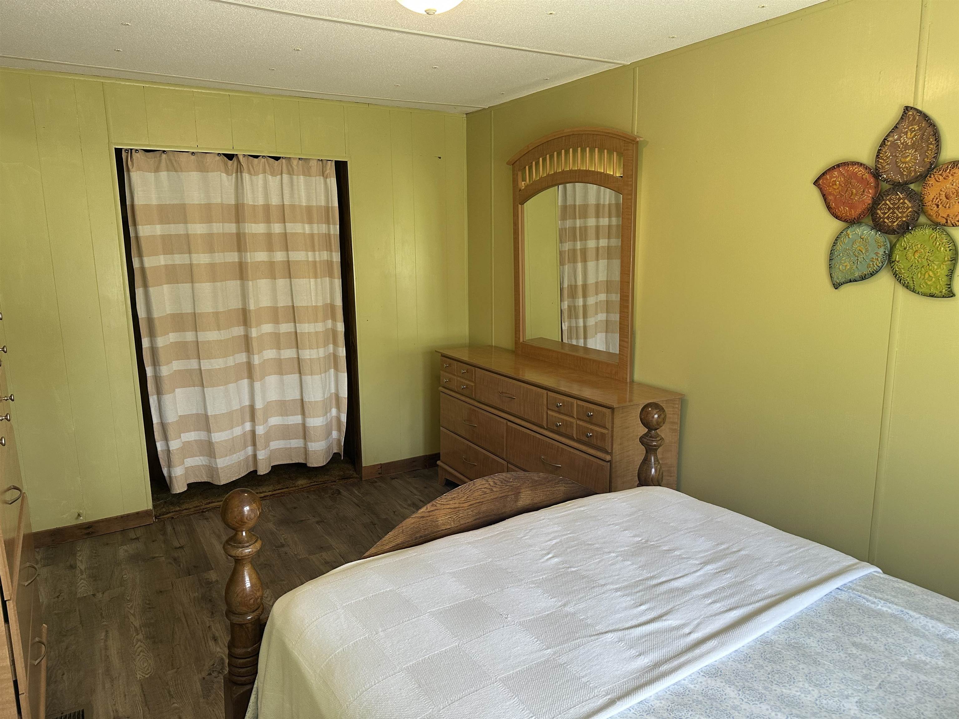 65 Cooksey Lane Michie, TN 38357 - Photo 13 of 40 a bedroom with a bed and window