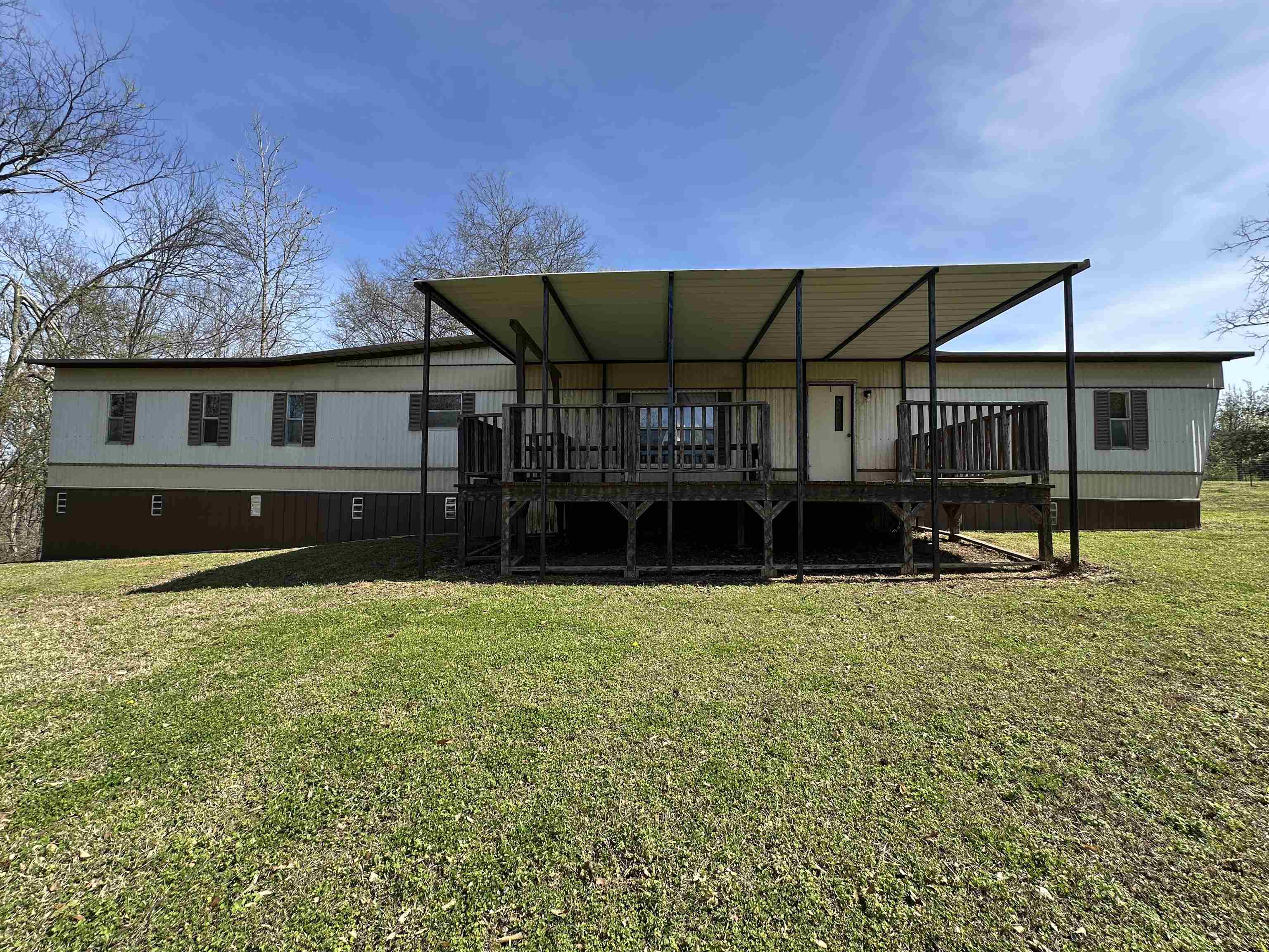 65 Cooksey Lane Michie, TN 38357 - Photo 23 of 40 front view of a house with a yard