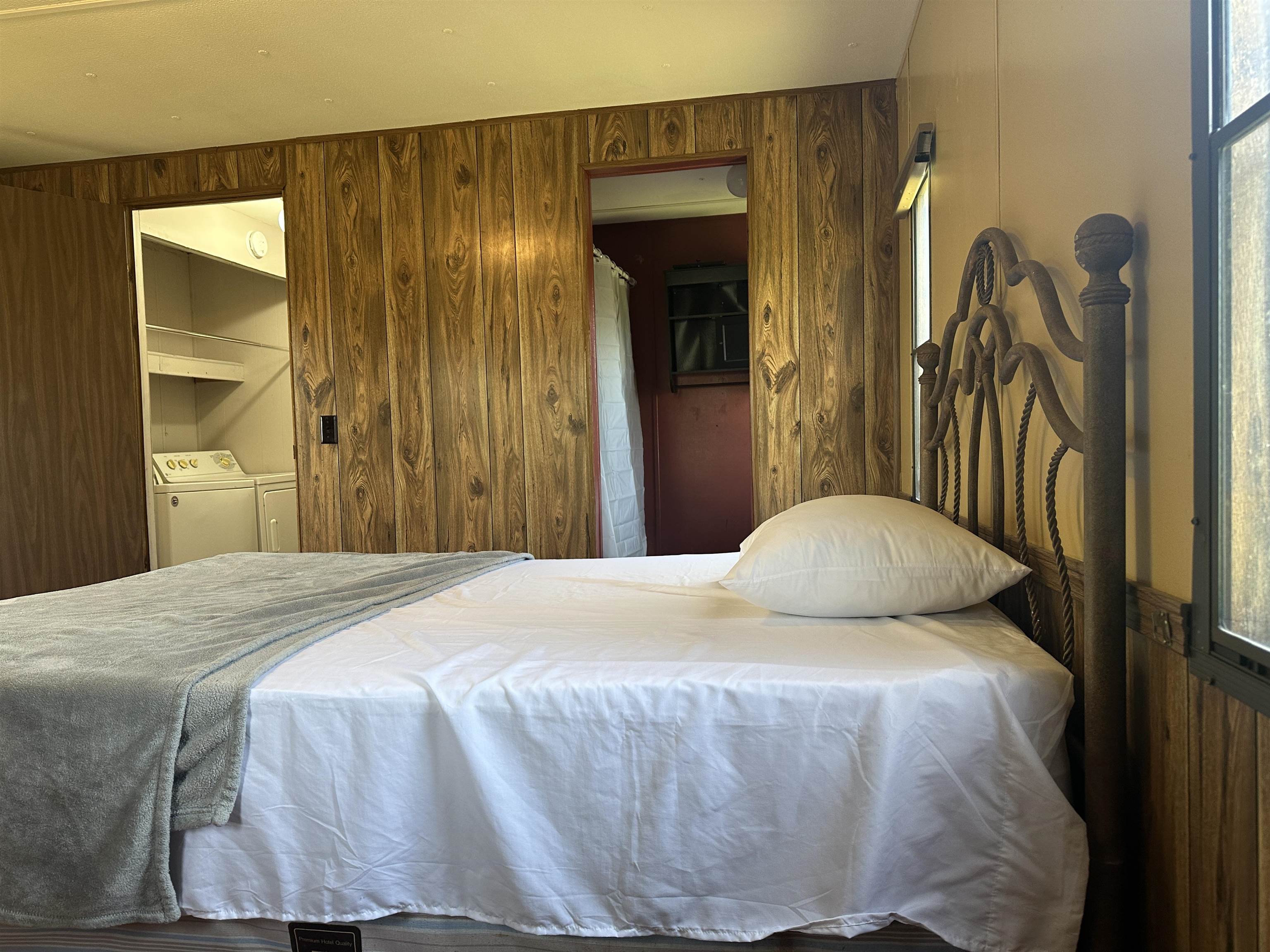65 Cooksey Lane Michie, TN 38357 - Photo 3 of 40 a bedroom with a bed and a mirror