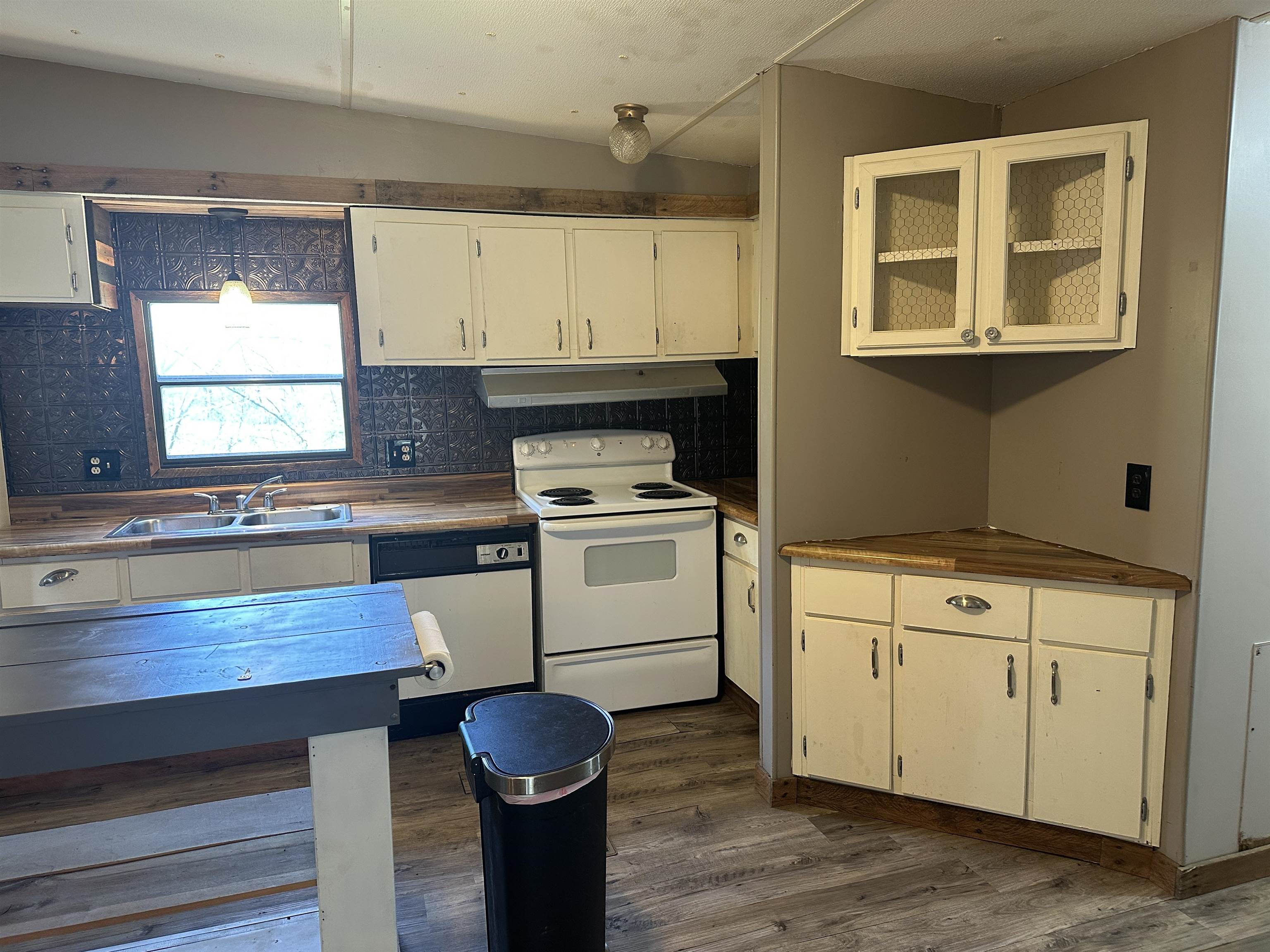 65 Cooksey Lane Michie, TN 38357 - Photo 6 of 40 a kitchen with a stove and a sink