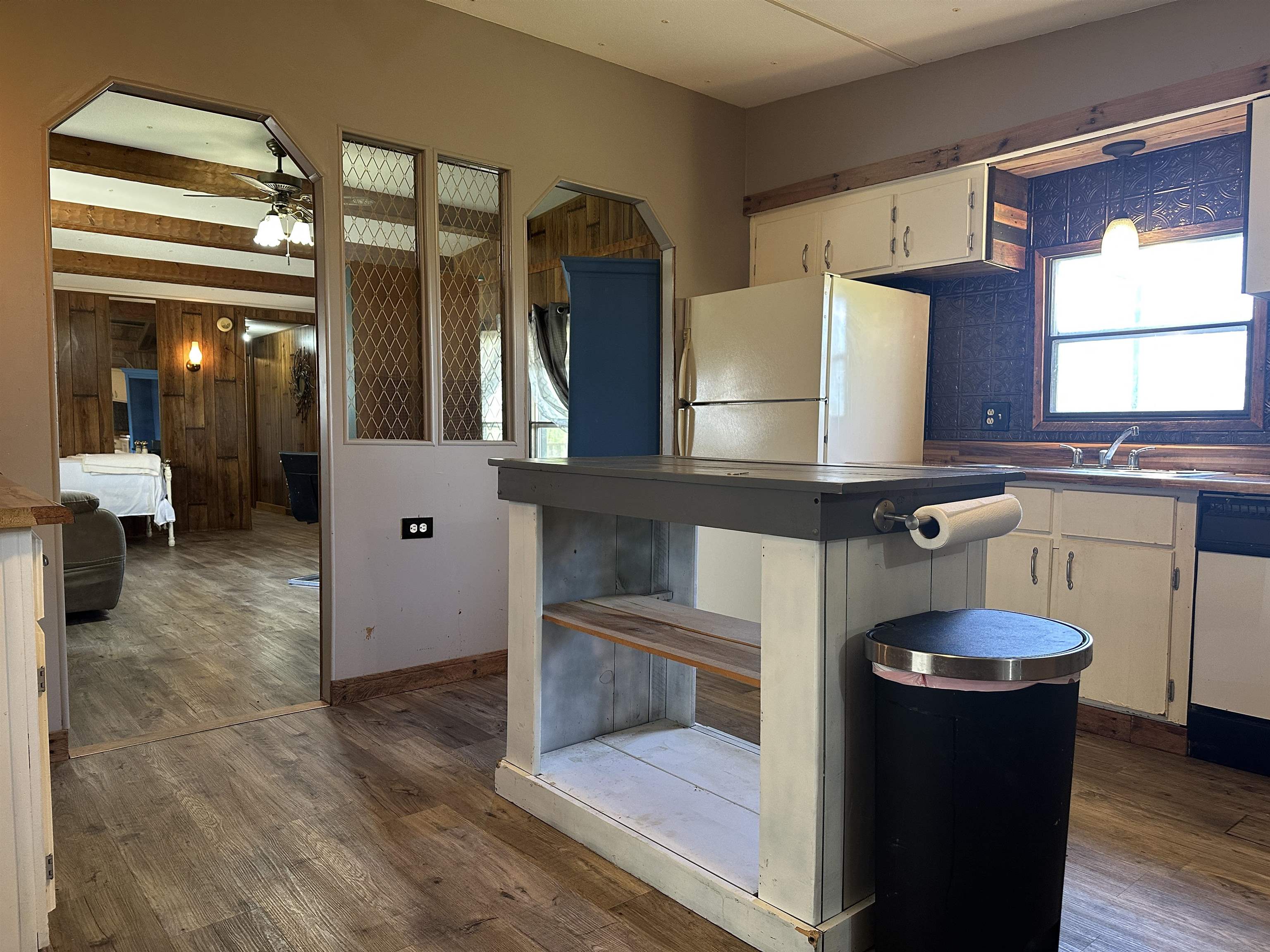 65 Cooksey Lane Michie, TN 38357 - Photo 8 of 40 a kitchen with stainless steel appliances granite countertop a refrigerator and a stove
