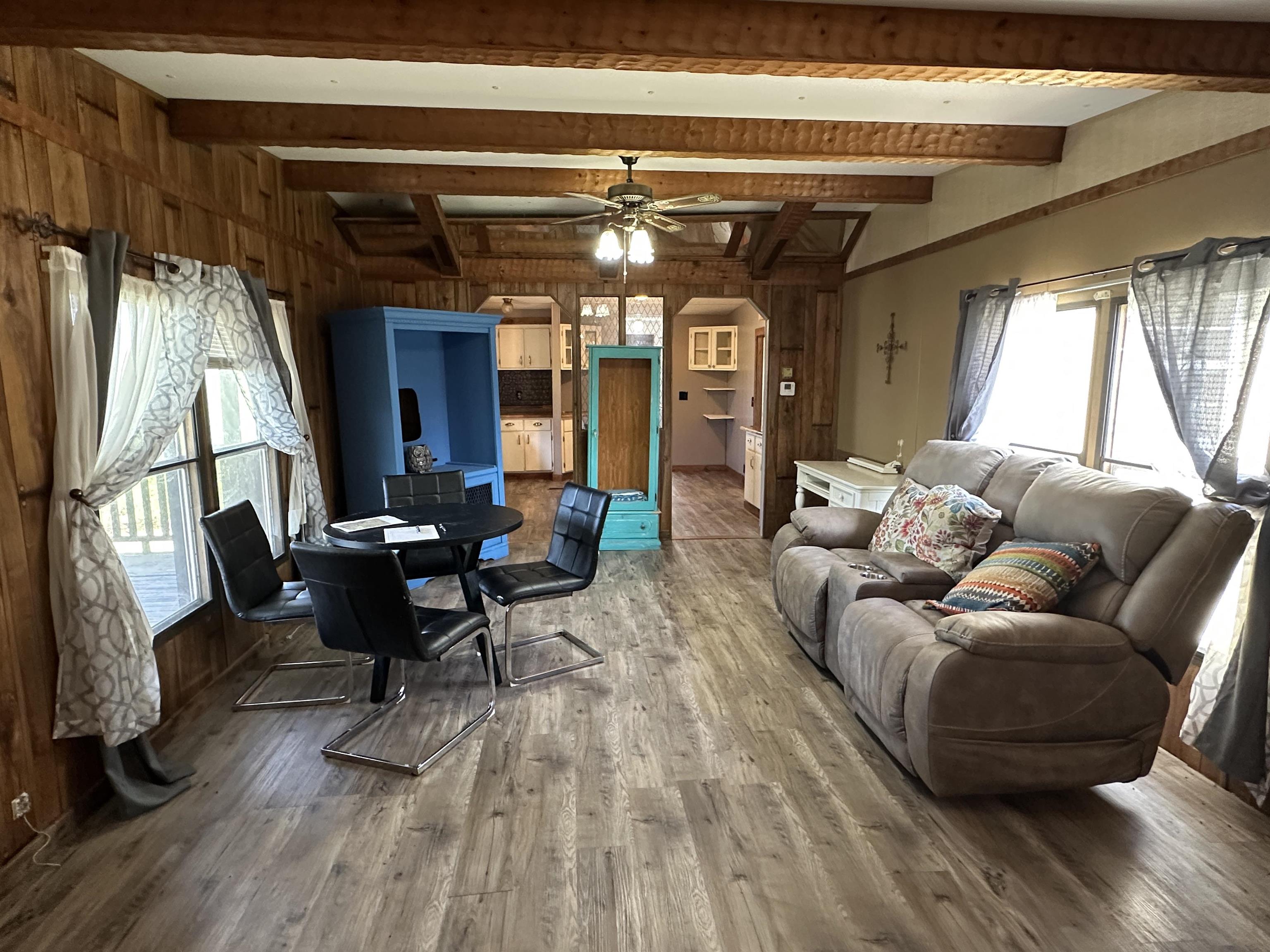 65 Cooksey Lane Michie, TN 38357 - Photo 10 of 40 a living room with furniture and a large window